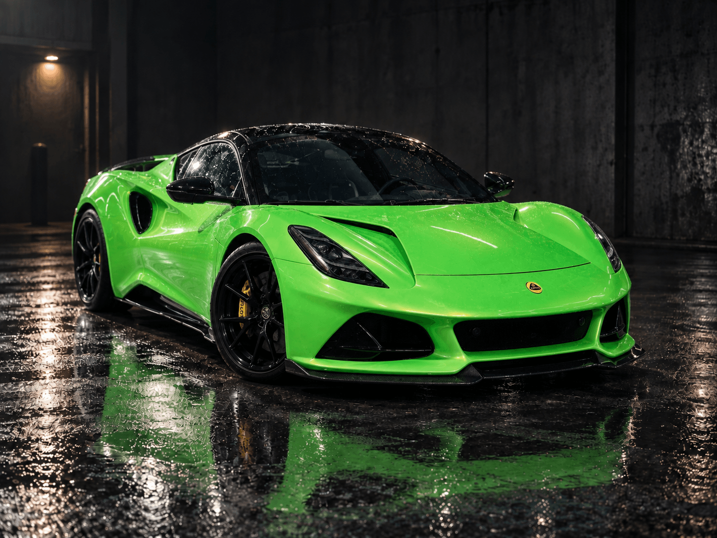 Lotus Emira wrapped in gloss viper green vinyl with black roof and yellow calipers