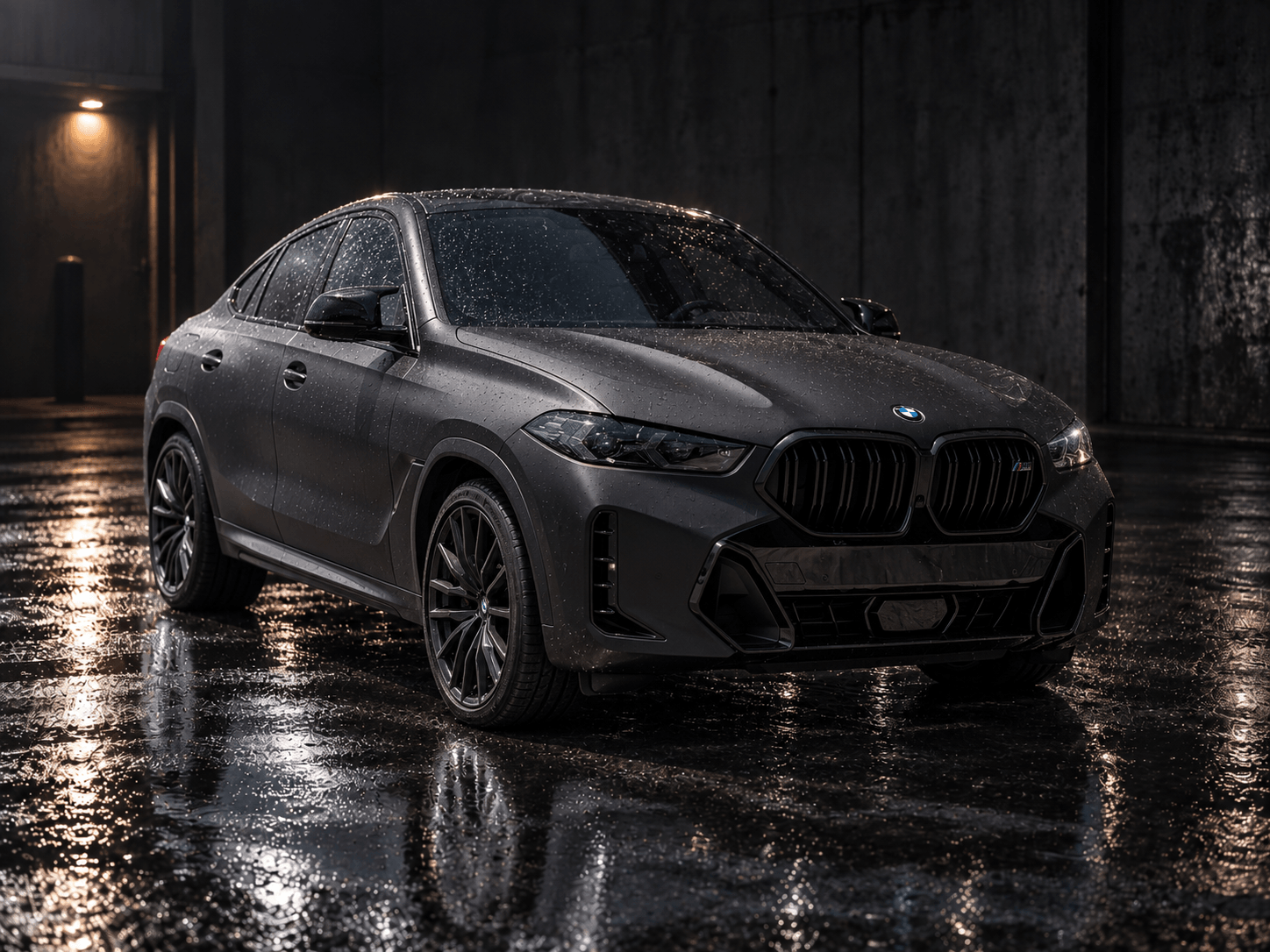 BMW X6 M wrapped in satin charcoal gray vinyl with black kidney grille